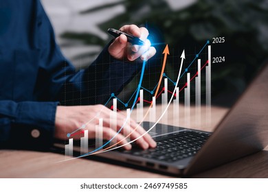 Business 2025 graphs statistics to analyze business potential concepts, Businesswomen use Laptop analytics charts, forecast the future, Marketing targets growth to optimize performance for profit. Adlı Stok Fotoğraf