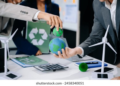business team people planning and discussing on recycle reduce reuse policy symbol in office meeting room. Green business company and Solar Energy Environment city Concept. Adlı Stok Fotoğraf