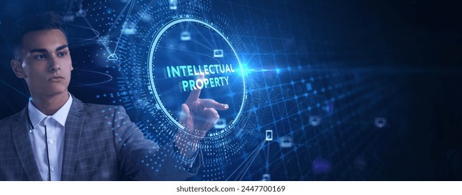 Business, technology, internet and network concept. Virtual screen of the future and sees the inscription: Intellectual property. 库存照片