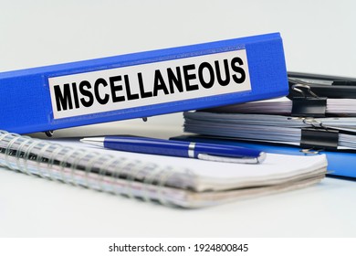Business and finance concept. On the table are a notebook, a pen, documents and a folder with the inscription - MISCELLANEOUS Stockfoto