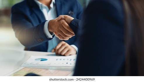 Business people, negotiation and handshake for deal, agreement or partnership in office. Shaking hands, closeup and hiring offer for recruitment, b2b collaboration or data analyst at table in meeting: stockfoto