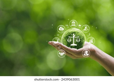 Concepts of international environmental law climate justice Ideas of environmental protection laws for sustainable business organizations and industries. Hand holding a green globe: stockfoto