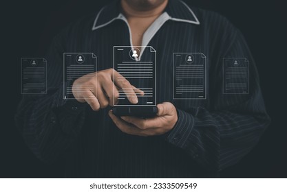 Concepts of practices and policies Company articles association forTerms and Conditions : Businessman using finger to select electronic document on a digital document in a virtual screen to read. Stock-foto