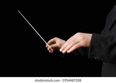 Conductor holding a baton - Offset Stockfoto
