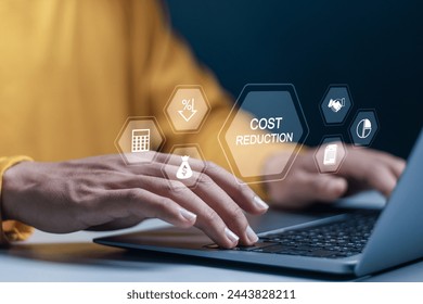 Cost reduction business finance concept. Budget management and cost management. Optimization, Strategy, Economic cost savings. Person using laptop with cost reduction icon. Foto stock
