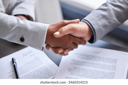 Closeup, deal and handshake for contract, agreement and success for broker in business office. People shaking hands, opportunity and b2b partnership for collaboration, trust and thank you in meeting Stock fotografie