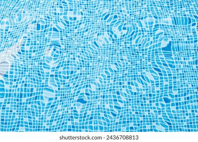 明るい青のタイルが並ぶプールで、波打つ水面を反射する光の接写の写真素材