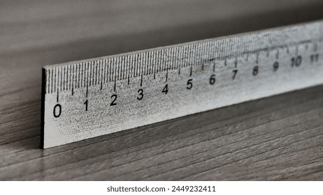 Close-up of a wooden centimeter ruler on a wooden table Stockfoto