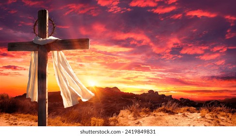 Cross With Robe And Crown Of Thorns On Hill At Sunset - Calvary And Resurrection Concept Stockfoto