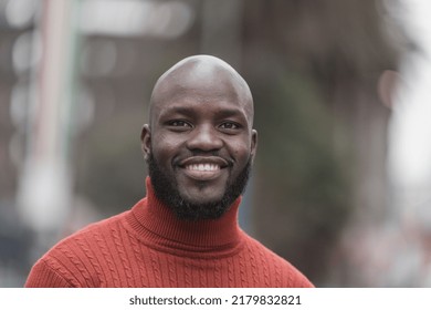 Creative emotional Portraits of young mid-adult Kenyan black Male Man with bald head Beards Simply smiling in the streets of Nairobi City County Kenyas Capital east Africa headshots portraits amazing  – Ảnh có sẵn