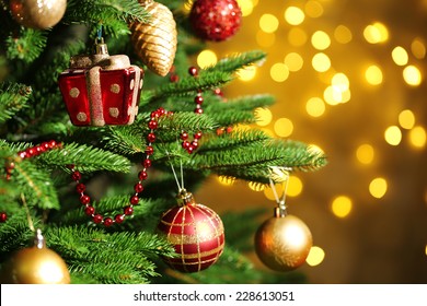 Decorated Christmas tree on  blurred, sparkling and fairy background Stock Photo