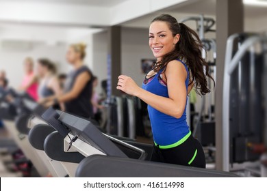 Diverse People Running on Treadmill Foto Stock