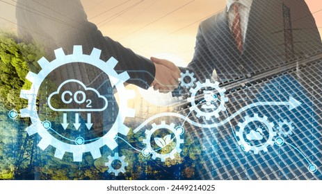 Double exposure graphic of business people working over wind turbine farm and green renewable energy worker interface. Concept of sustainability development by alternative energy. Adlı Stok Fotoğraf