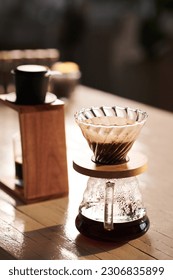 Dripper for making morning coffee on table in coffeeshop 库存照片