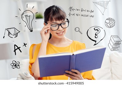 education, knowledge, vision, literature and people concept - smiling young asian woman or student girl in glasses reading book at home over school doodles Stock Photo