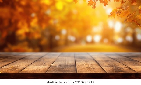 The empty wooden table top with blur background of autumn. Exuberant image. 库存照片