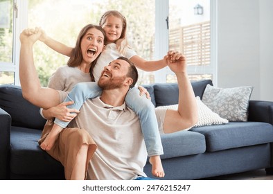 Excited, family and portrait on shoulder by sofa for weekend fun, happiness and bonding together. Playful, dad and mom with daughter in living room for love, support and care at home on fathers day Arkistovalokuva