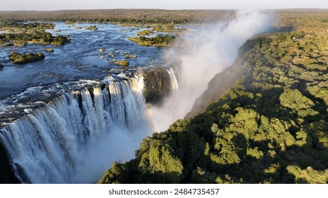 Famous Water Falls At Victoria Falls In Matabeleland North Zimbabwe. Giant Waterfalls. Nature Landscape. Victoria Falls At Matabeleland North Zimbabwe. Zambezi River. Travel Scenery. Arkistovalokuva