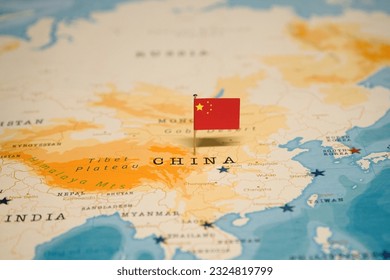 The Flag of China on the World Map. 库存照片