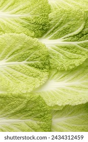 Fresh Chinese cabbage leaves as background, top view 库存照片