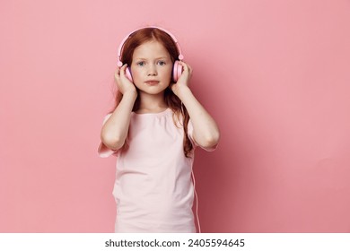 Girl person little music sound children listen enjoy cute young childhood audio Stock Photo