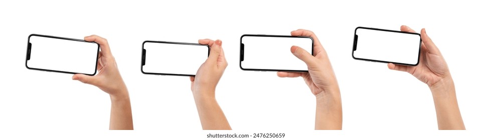 Hand holding the black smartphone with blank screen isolated on white background, clipping path. Stock fotografie