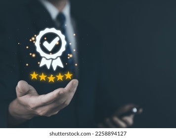 Hand showing best quality guarantee icon. check mark and five stars, the leading service concept Product performance assurance digital technology and industry-leading ISO certification Stockfoto