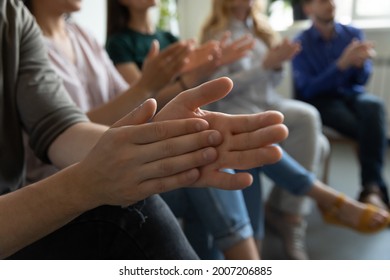 Hands of audience applauding speaker, presenter for speech, presentation, training. Group of employees expressing recognition and acknowledgement to colleague or team leader, clapping hands. Close up Arkistovalokuva