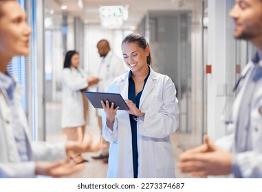 Стоковая фотография: Happy woman doctor on tablet for employees management, hospital workflow and clinic staff solution on software or app. Healthcare manager on digital tech for medical team research or problem solving