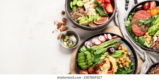 Healthy vegetarian and vegan  salads and Buddha Bowls with vitamins, antioxidants, protein on light  background. Top view, copy space Stock-foto