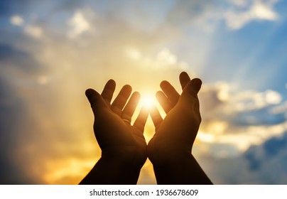 Human hands open palm up worship. Eucharist Therapy Bless God Helping Repent Catholic Easter Lent Mind Pray. Christian Religion concept background. fighting and victory for god Stock Photo