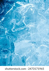 icecubes background,icecubes texture,icecubes wallpaper,ice helps to feel refreshed and cool water from the icecubes helps the water refresh your life and feel good.ice drinks for refreshment business 库存照片