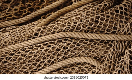 industrial fishing net with ropes as background Foto stock