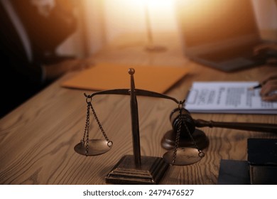 Judge gavel with Justice lawyers having team meeting at law firm background. Concepts of Law and Legal services.: stockfoto