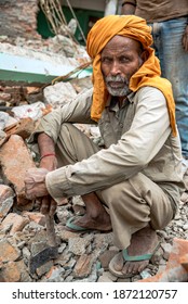 Kathmandu, Kathmandu, Nepal - August 5, 2015: A Laborer Scavenging Bricks From The Earthquake Wreckage In Kathmandu, Nepal Editorial Stock Photo