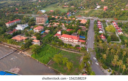 Kep city / Cambodia - May 20 2019 : aerial of Kep beach with crab market and small town Redaktionelt stock-foto