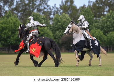 Knight jousting. Medieval knights during a jousting tournament. Knights competition. Stockfoto