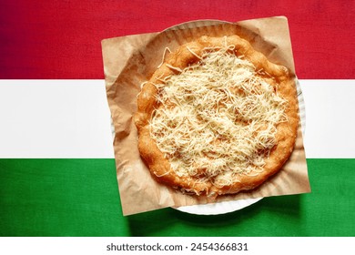 Стоковая фотография: Langos with Hungary flag on wooden background