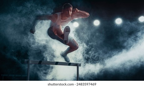 Male Super Athlete Runner in Mid-leap Over Hurdle, Captured in Dramatic Lighting and Smoke. Intense Focus, Agility, and Strength in High-energy Track and Field Event. स्टॉक फ़ोटो