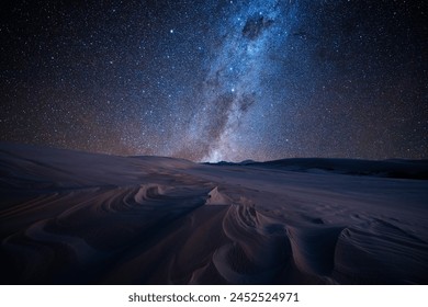 Milky way over sand dunes at Dark point, Myall Lakes National Park, Hawks Nest, NSW, Australia	, fotografie de stoc