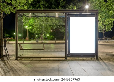 Mockup Of Bus Stop Vertical Billboard In Front Of Empty Street Background At Night. Blank Advertising Display In A Park ภาพถ่ายสต็อก