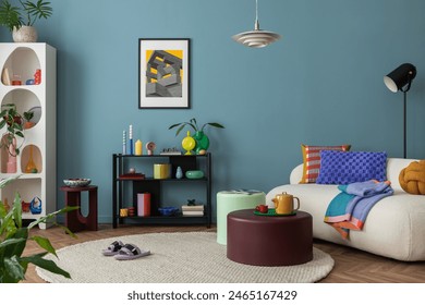 Modern and colorful interior of living room with design boucle sofa, mock up poster, shelf, plants, decorations and personal stuff. Home decor.	 Arkistovalokuva