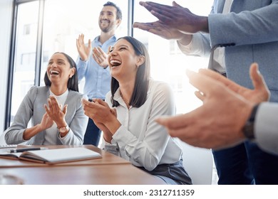 Motivation, audience with an applause and in a business meeting at work with a lens flare together. Support or celebration, success and colleagues clapping hands for good news or achievementの写真素材