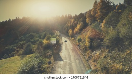 Mountain Hill Country Road Car Drive Aerial View. Roadside Automobile Highland Scenery Landscape Overview. Dense Green Forest Unpolluted Natural Environment Concept. Stock Photo