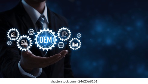OEM, Original Equipment Manufacturer. Businessman with OEM icon for strategies production to company that manufactures and sells products or parts of a product that their buyer. 库存照片