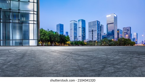 Panoramic skyline and modern commercial office buildings with empty road in Shenzhen, China. Asphalt road and cityscape. Stock-foto