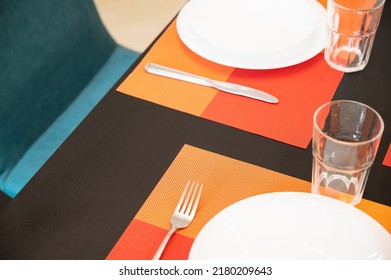 A partial view of a dining table setting at a residence located in Cairo, Egypt. The shot was taken back on June 20, 2022. Foto Stock