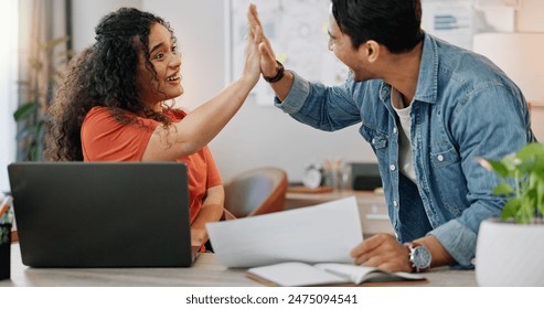 People, creative and business high five with laptop in office, start up and agency sales report achievement or paperwork. Support, happy employees and celebration for work mission, contract and goals Stock-foto