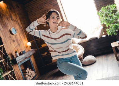 Photo of carefree energetic crazy young person enjoy spend free time weekend dancing apartment inside 库存照片