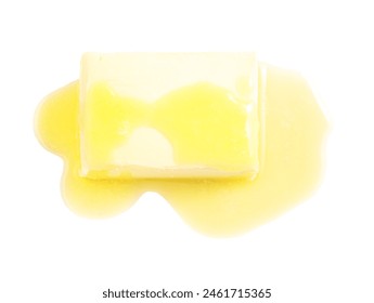 Piece of melting butter on white background, top view Foto stock